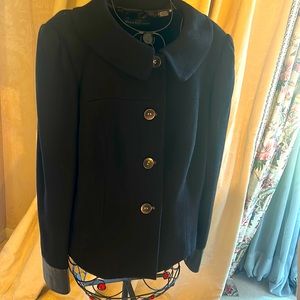 Dana Buchman. Leather sleeve